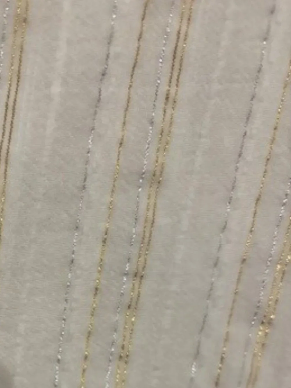 White Top with stripes of gold and silver foil